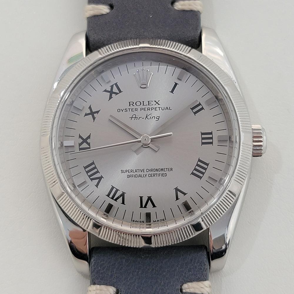 A rare classic, Men's Rolex Oyster Perpetual ref.114210 Air King, automatic watch, c.2007, in excellent working condition. Verified authentic by a master watchmaker. Gorgeous Rolex signed silver-gray dial, Roman numeral and applied baton hour