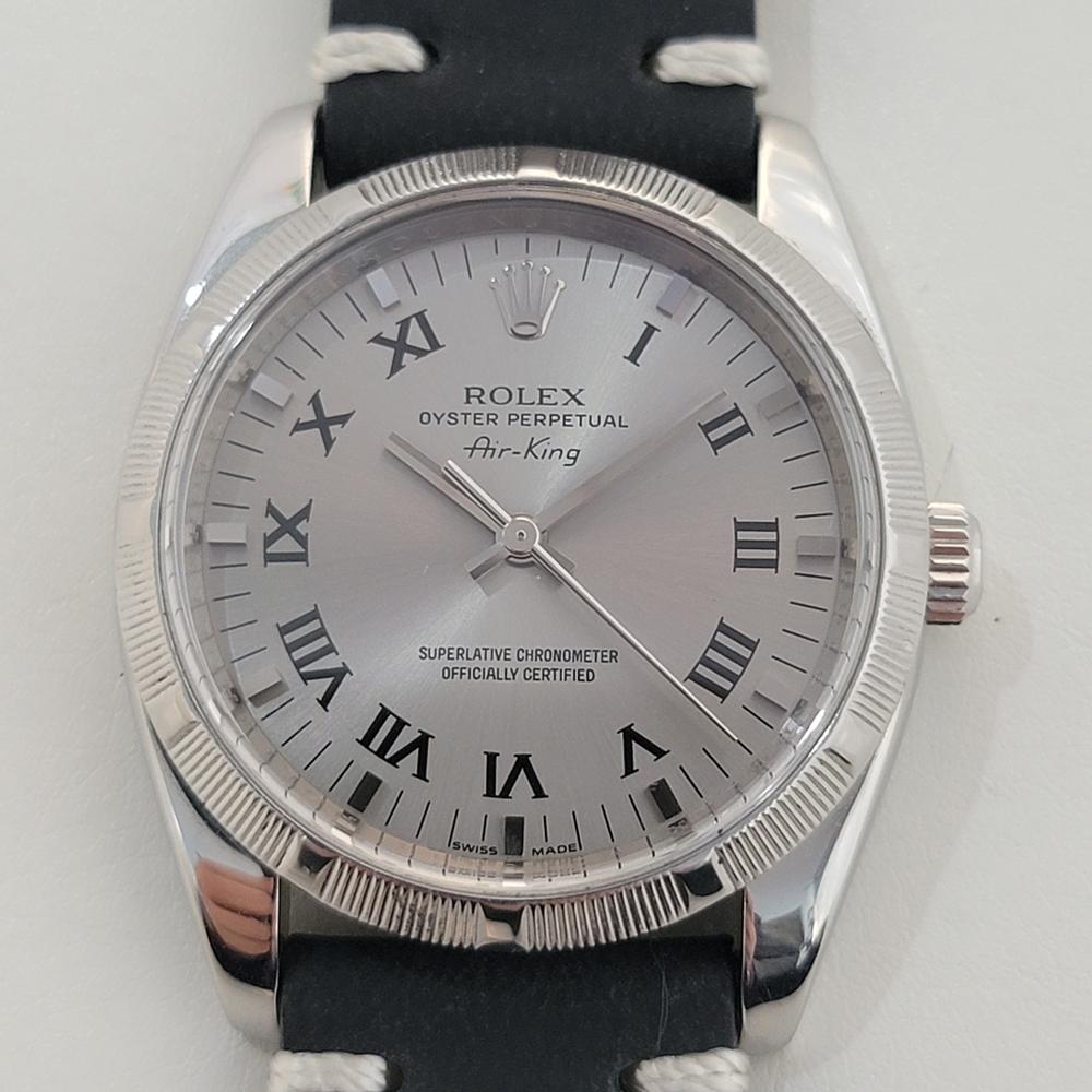 A rare gem, Men's Rolex Oyster Perpetual ref.114210 Air King, automatic watch, c.2007, in excellent working condition. Verified authentic by a master watchmaker. Gorgeous Rolex signed silver-gray dial, Roman numeral and applied baton hour markers,