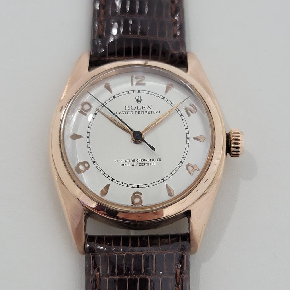 Classic luxury, Men's solid 18k rose gold Rolex ref.4392 Oyster Perpetual bubble back automatic dress watch, c.1940s. Verified authentic by a master watchmaker. Gorgeous Rolex signed dial, applied dagger and Arabic numeral hour markers, gilt minute