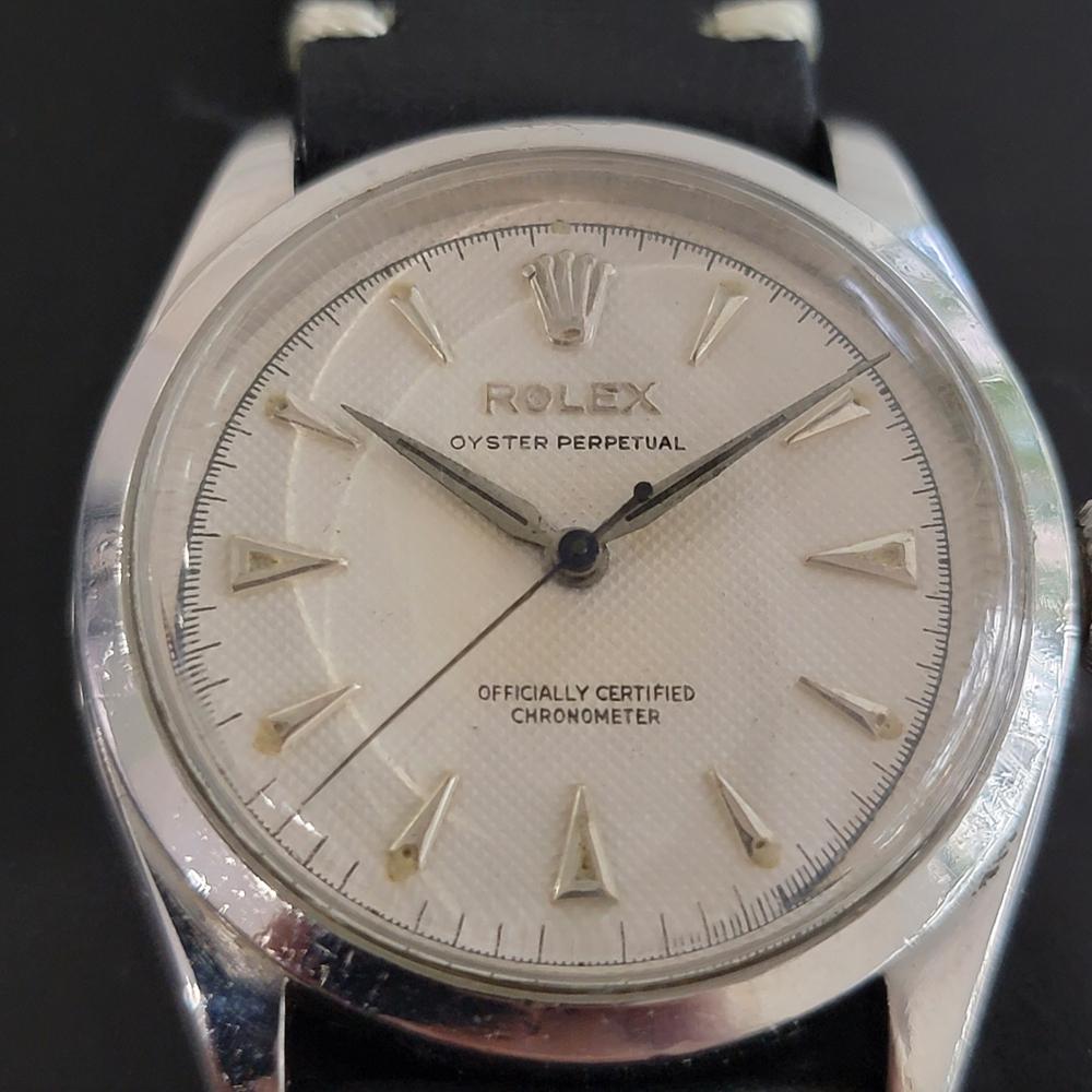 A rare vintage classic, Men's Rolex Oyster Perpetual 6284 bubble back automatic dress watch, c.1955. Verified authentic by a master watchmaker. Gorgeous Rolex signed white textured dial, applied indice hour markers, minute and hour hands, sweeping