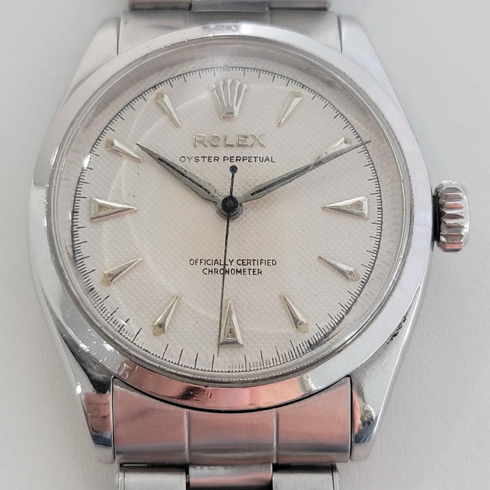 A rare vintage classic, Men's Rolex Oyster Perpetual ref. 6284 bubble back automatic dress watch, c.1955, all original. Verified authentic by a master watchmaker. Gorgeous Rolex signed white textured dial, applied dagger indice hour markers, minute