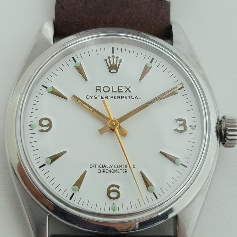 A rare iconic classic, Men's Rolex ref.6564 Oyster Perpetual automatic dress watch, c.1956. Verified authentic by a master watchmaker. Gorgeous Rolex signed white dial, dial cleaned and restored to exact specs, applied dagger and Roman numeral 3, 6,