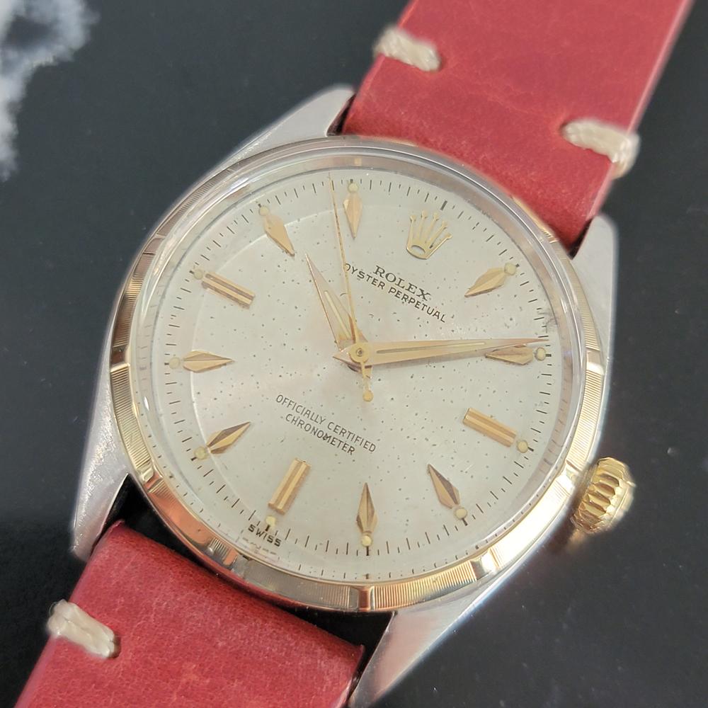 Iconic classic, Men's 14k gold and stainless steel Rolex ref.6565 Oyster Perpetual automatic dress watch, c.1955. Verified authentic by a master watchmaker. Gorgeous Rolex signed dial, applied indice and arrowhead hour markers, gilt minute and hour