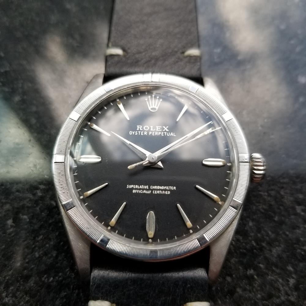 Iconic classic, men's Rolex Oyster Perpetual Ref.1007 automatic, c.1961. Verified authentic by a master watchmaker. Stunning Rolex signed vintage black dial, applied indice hour markers, silver minute and hour hands, sweeping central second hand,
