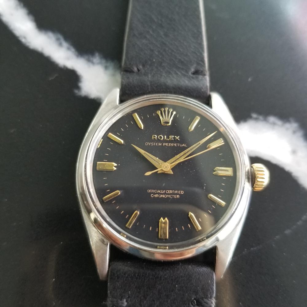 A rare timeless classic, Men's Rolex ref.6564 Oyster Perpetual automatic dress watch, c.1957. Verified authentic by a master watchmaker. Gorgeous Rolex signed black dial, applied indice hour markers, gilt minute and hour hands, sweeping central