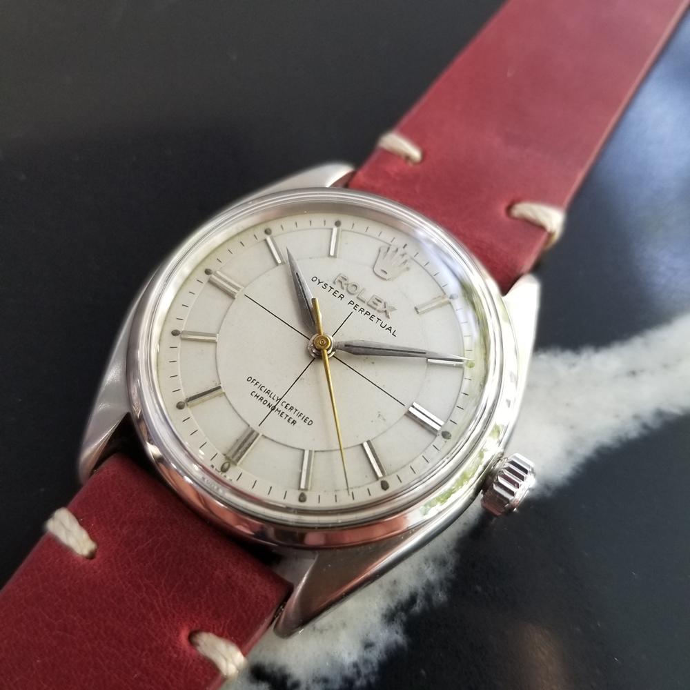 A luxurious classic, Men's Rolex ref.6564 Oyster Perpetual automatic dress watch, c.1955. Verified authentic by a master watchmaker. Gorgeous Rolex signed dial, applied indice hour markers, silver minute and hour hands, sweeping central second hand,