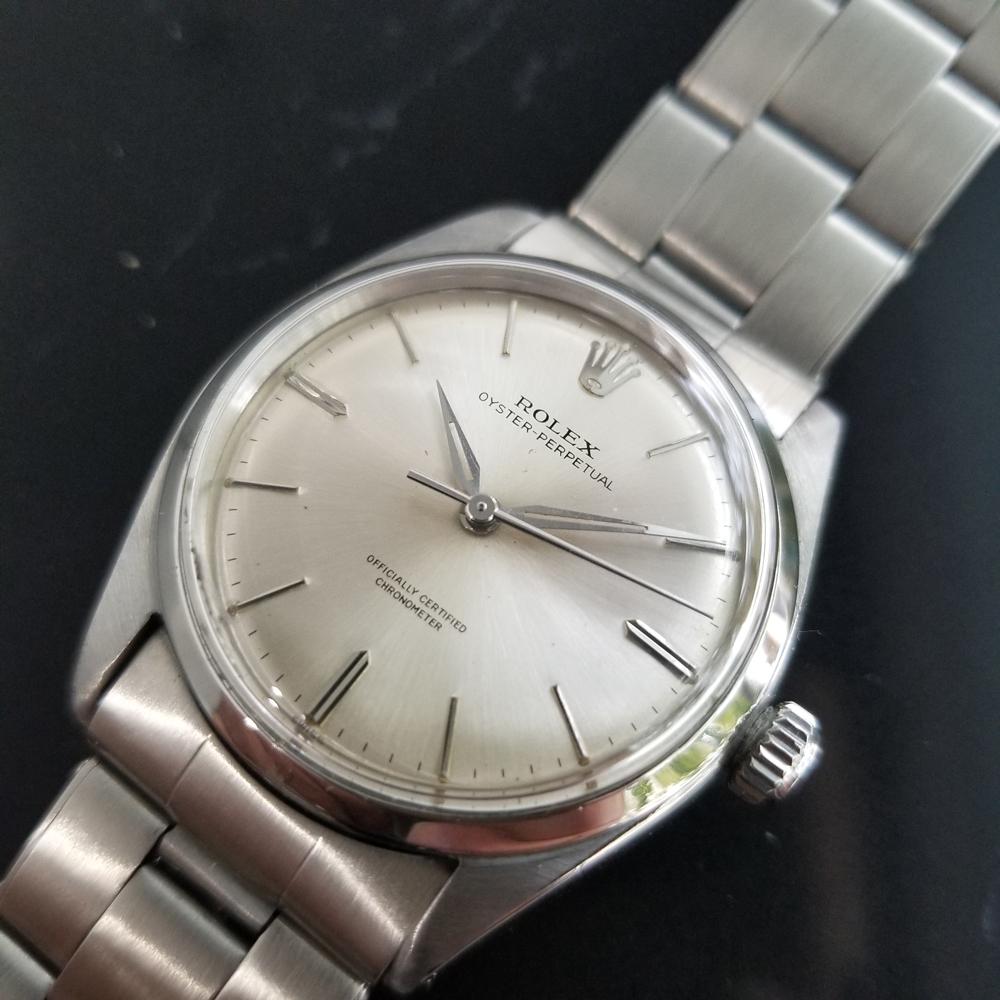 Iconic classic, rare model Men's Rolex Oyster Perpetual ref.6564 automatic dress watch, c.1958, all original. Verified authentic by a master watchmaker. Gorgeous Rolex signed silver dial, applied indice hour markers, silver lumed minute and hour