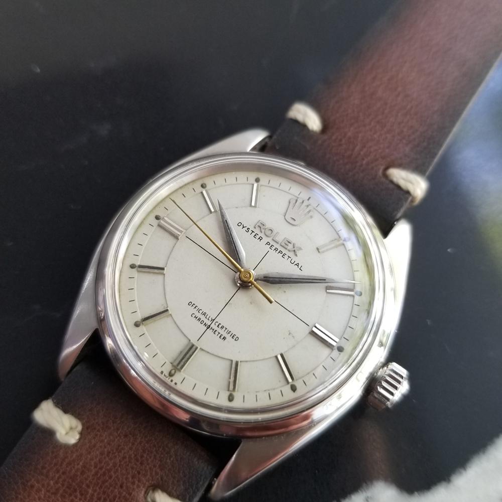 A rare classic, Men's Rolex ref.6564 Oyster Perpetual automatic dress watch, c.1955. Verified authentic by a master watchmaker. Gorgeous Rolex signed dial, applied indice hour markers, silver minute and hour hands, sweeping central second hand,