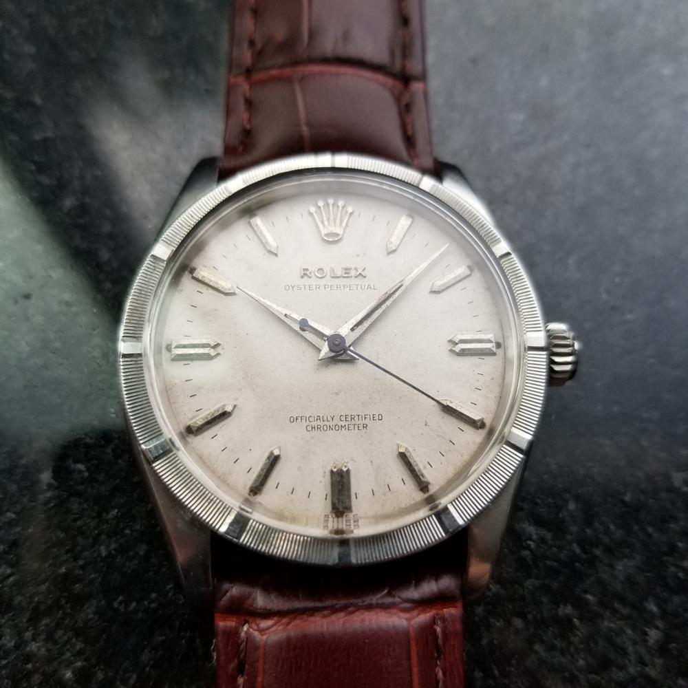 Timeless icon, men's rare Rolex Oyster Perpetual ref.6569 automatic, c.1950s. Verified authentic by a master watchmaker. Original, unrestored Rolex signed silver dial, applied silver baton hour markers, silver minute and hour hands, sweeping central