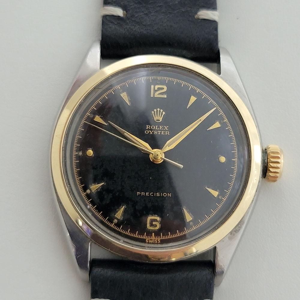 Classic luxury, Men's Rolex ref.6022 Oyster Precision hand-wind dress watch, c.1950s. Verified authentic by a master watchmaker. Gorgeous Rolex signed black dial, applied gold dagger and Arabic numeral 6 and 12 hour markers, gilt minute and hour