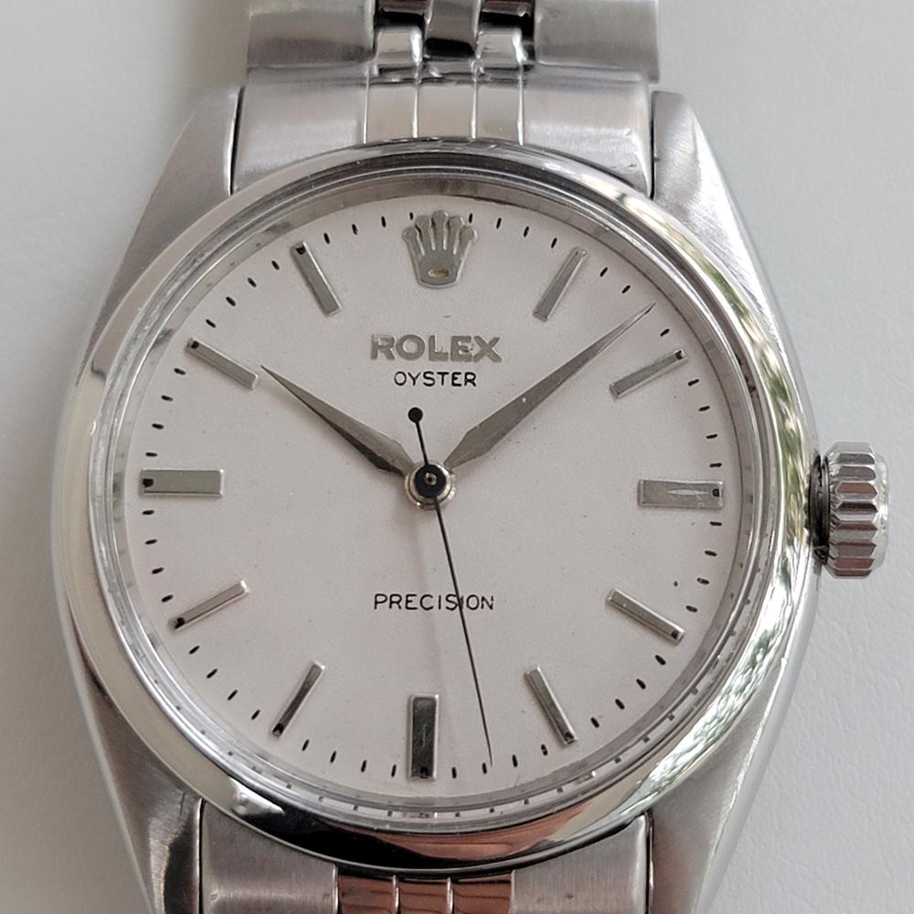 Vintage classic, Men's Rolex ref.6422 Oyster Precision hand-wind dress watch, c.1957, all original. Verified authentic by a master watchmaker. Gorgeous Rolex signed silver dial, applied silver indice hour markers, silver minute and hour hands,