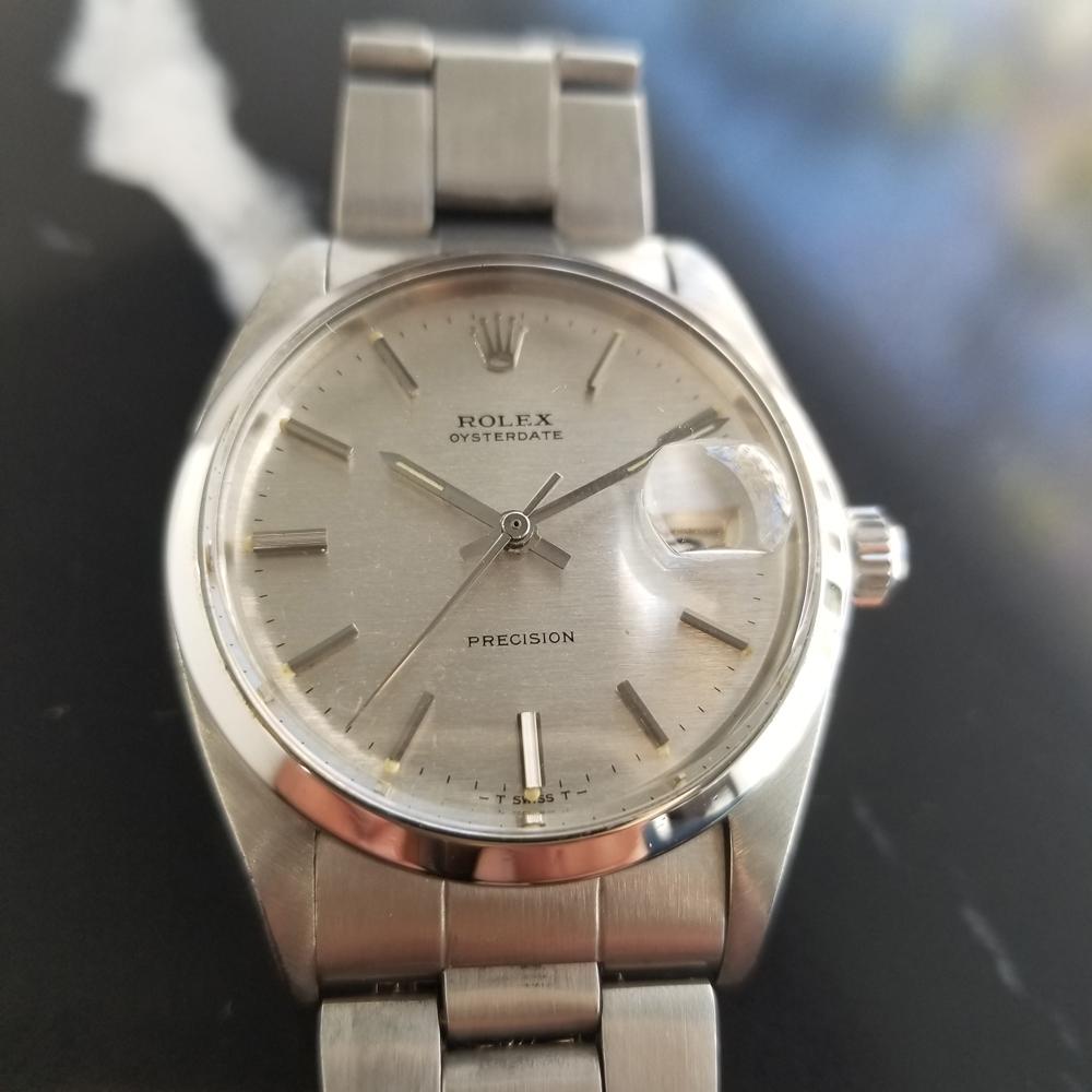 Iconic classic, Men's all-stainless steel Rolex Oysterdate Precision 6694 manual wind, c.1971, all original. Verified authentic by a master watchmaker. Gorgeous, Rolex silver textured dial, applied silver baton hour markers, silver minute and hour