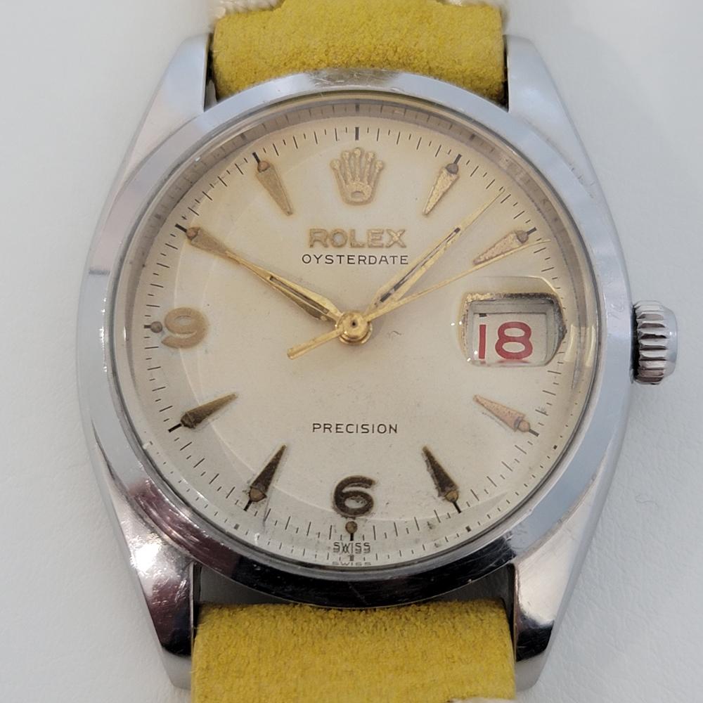 Timeless classic, Men's Rolex ref.6494 Oysterdate Precision hand-wind dress watch with roulette red-black date wheel, c.1957. Verified authentic by a master watchmaker. Gorgeous Rolex signed white tropical dial, applied indice and Arabic numeral 6,9