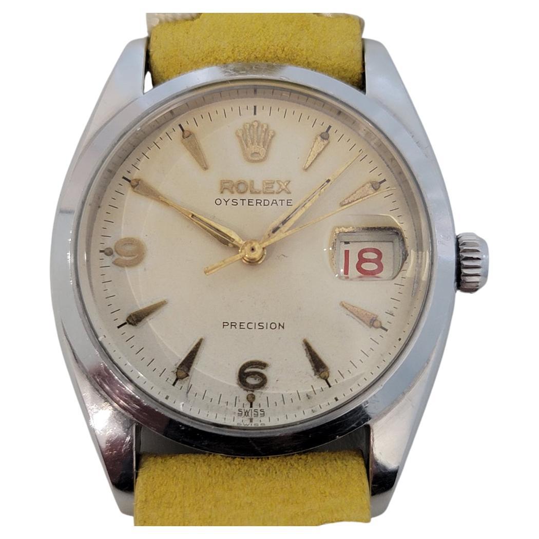 Timeless classic, Men's Rolex ref.6494 Oysterdate Precision hand-wind dress watch with roulette red-black date wheel, c.1957. Verified authentic by a master watchmaker. Gorgeous Rolex signed white tropical dial, applied indice and Arabic numeral 6,9