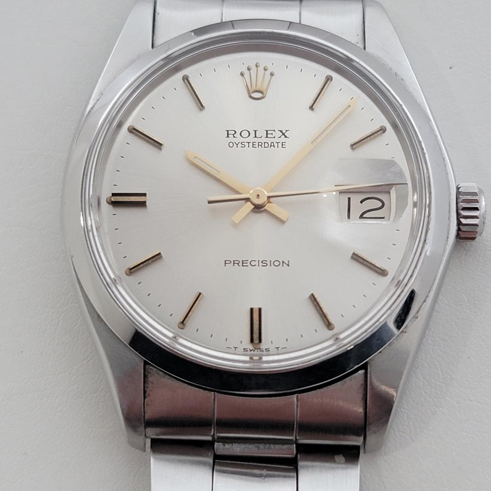 Timeless classic, Men's Rolex Oysterdate Precision ref 6694 hand-wind dress watch, c.1977, in excellent working condition. Verified authentic by a master watchmaker. Gorgeous Rolex signed silver dial, complimented beautifully with applied baton gold