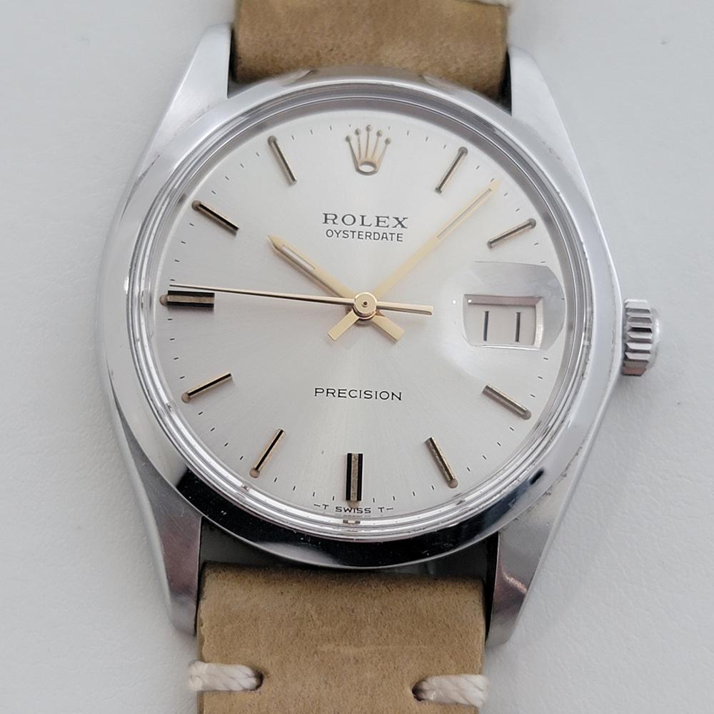Timeless classic, Men's Rolex Oysterdate Precision ref 6694 hand-wind dress watch, c.1977, in excellent working condition, with Rolex Service Card. Verified authentic by a master watchmaker. Gorgeous Rolex signed silver dial, complimented