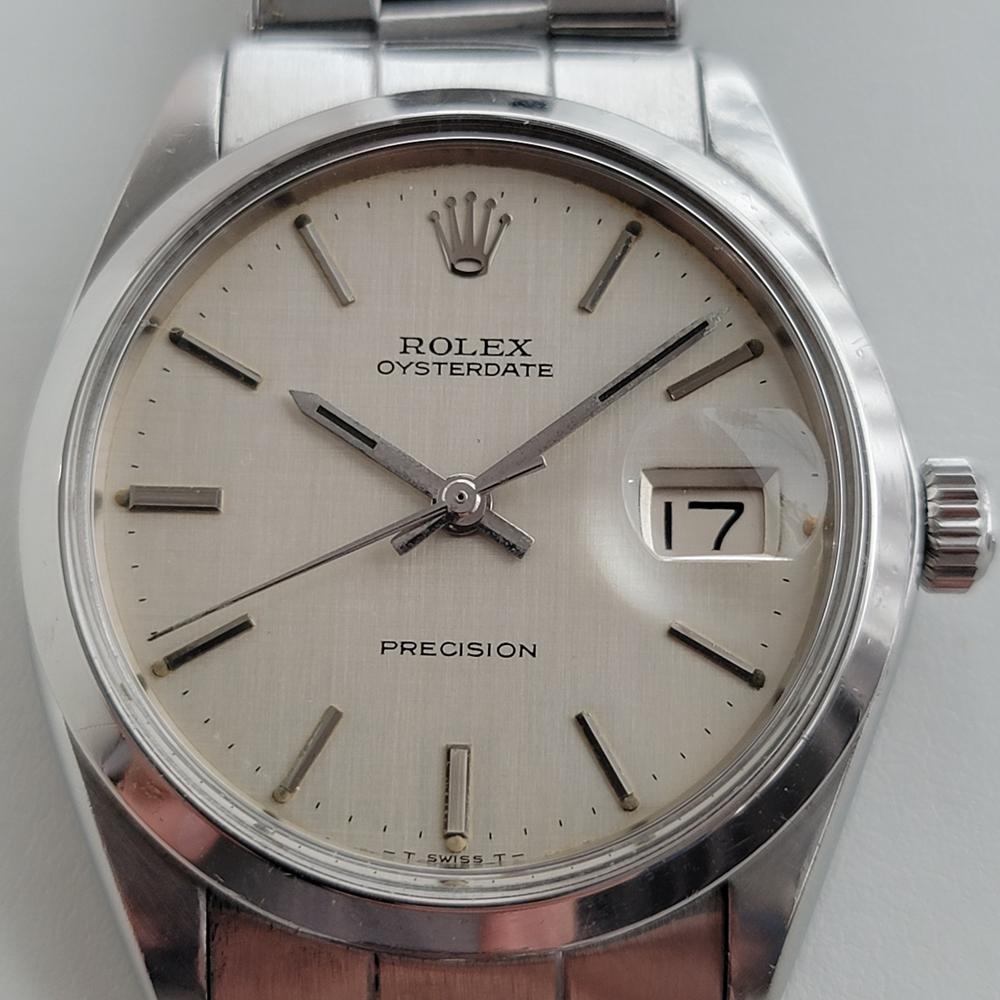 Classic icon, Men's Rolex ref.6694 Oysterdate Precision hand-wind dress watch, c.1969, all original. Verified authentic by a master watchmaker. Gorgeous Rolex signed silver textured dial, applied indice hour markers, silver minute and hour hands,