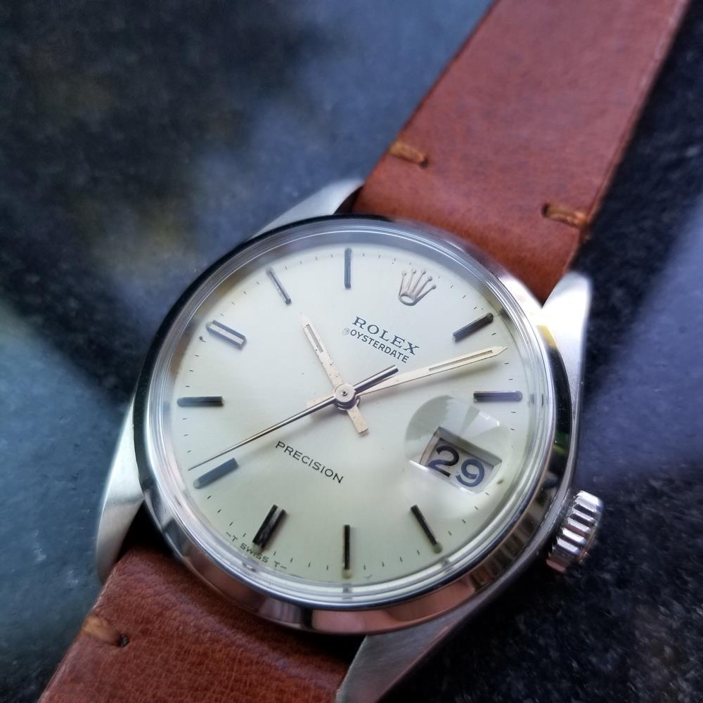Timeless icon, men's Rolex Oysterdate ref.6694 manual hand-wind, c.1974. Verified authentic by a master watchmaker. Gorgeous cream Rolex signed dial, applied index hour markers, gold minute and hour hands, sweeping central second hand, date display