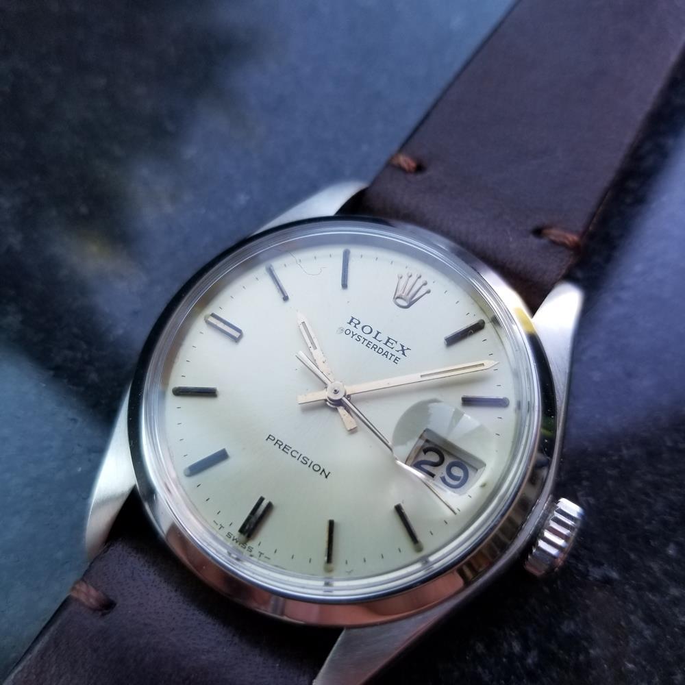 Vintage icon, men's Rolex Oysterdate ref.6694 manual hand-wind, c.1974. Verified authentic by a master watchmaker. Gorgeous cream Rolex signed dial, applied index hour markers, gold minute and hour hands, sweeping central second hand, date display