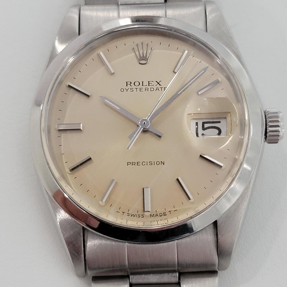 Iconic classic, Men's Rolex ref.6694 Oysterdate Precision hand-wind dress watch, c.1973, all original. Verified authentic by a master watchmaker. Gorgeous Rolex signed cream dial, applied indice hour markers, silver minute and hour hands, sweeping