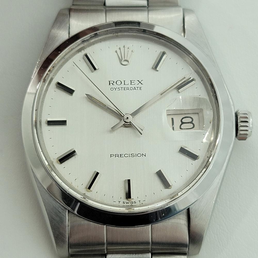 Iconic classic, Men's Rolex ref.6694 Oysterdate Precision hand-wind dress watch, c.1972, all original, virtually unworn condition. Verified authentic by a master watchmaker. Gorgeous classic Rolex signed silver dial, applied indice hour markers,
