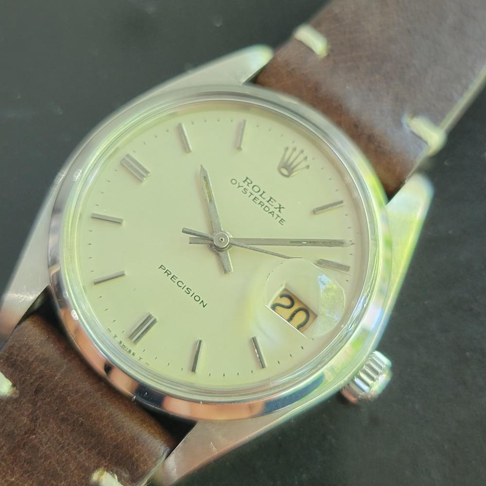 Classic icon, Men's Rolex ref.6694 Oysterdate Precision hand-wind dress watch, c.1980. Verified authentic by a master watchmaker. Gorgeous Rolex signed creamy white dial, applied indice hour markers, silver minute and hour hands, sweeping central