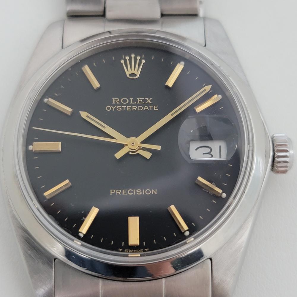 Iconic classic, Men's Rolex ref.6694 Oysterdate Precision hand-wind dress watch, c.1983, all original. Verified authentic by a master watchmaker. Gorgeous Rolex signed black dial, applied indice hour markers, gilt minute and hour hands, sweeping
