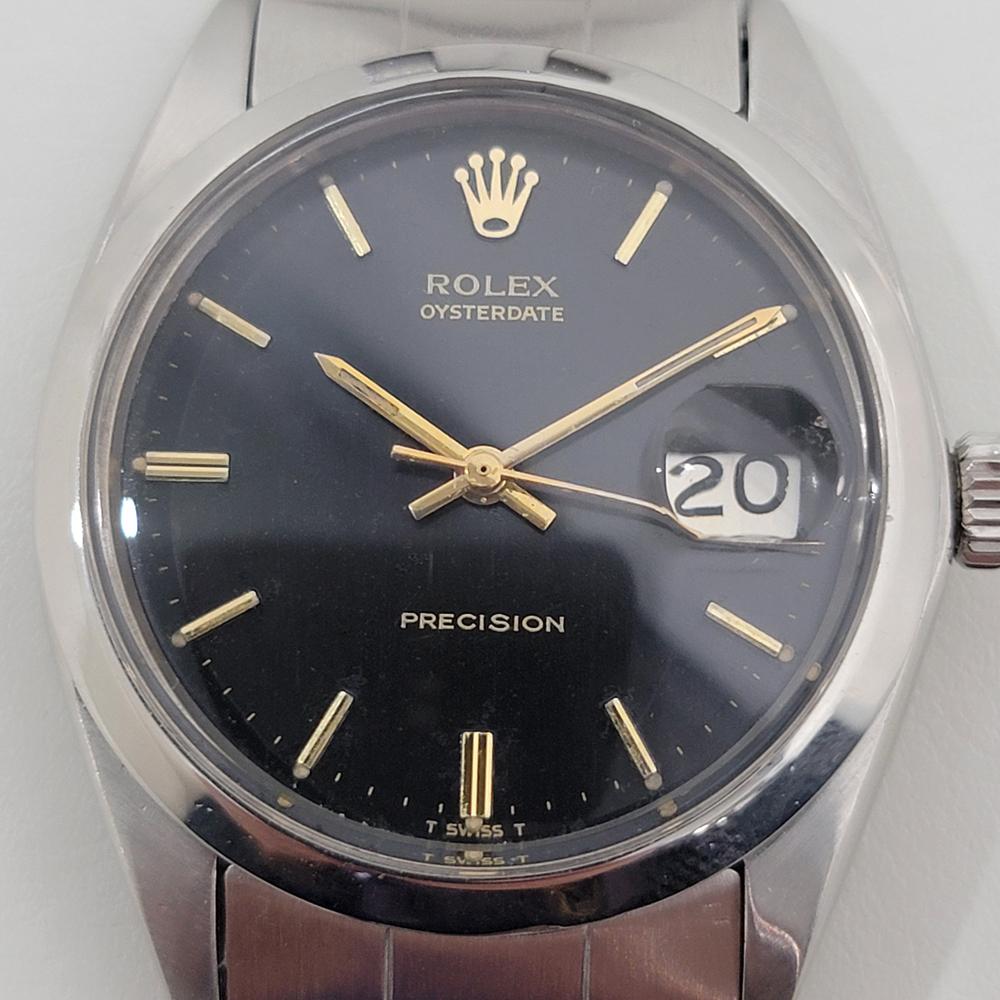 Iconic vintage classic, all-stainless steel Men's Rolex Oysterdate Precision ref.6694, hand-wind dress watch, c.1967, in excellent working condition. Verified authentic by a master watchmaker. Gorgeous Rolex signed black dial, applied baton index