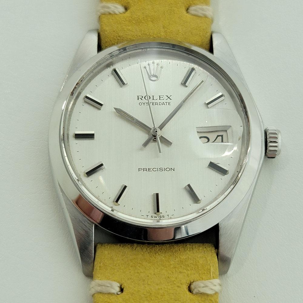 Vintage classic, Men's Rolex ref.6694 Oysterdate Precision hand-wind dress watch, c.1972, in like new condition. Verified authentic by a master watchmaker. Gorgeous classic Rolex signed silver dial, applied indice hour markers, silver minute and