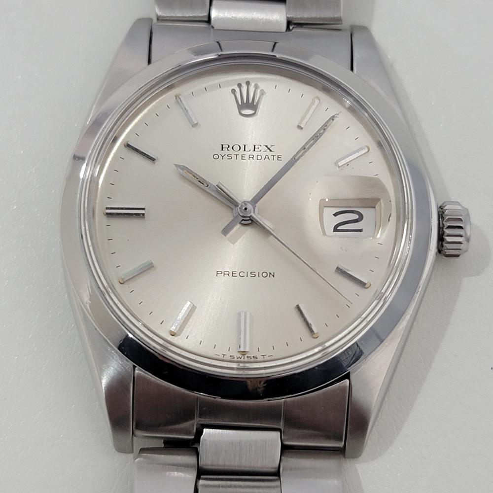 Iconic classic, Men's Rolex Oysterdate Precision ref.6694, hand-wind dress watch, c.1972, in excellent working condition. Verified authentic by a master watchmaker. Gorgeous Rolex signed silver dial, applied baton index hour markers, silver minute