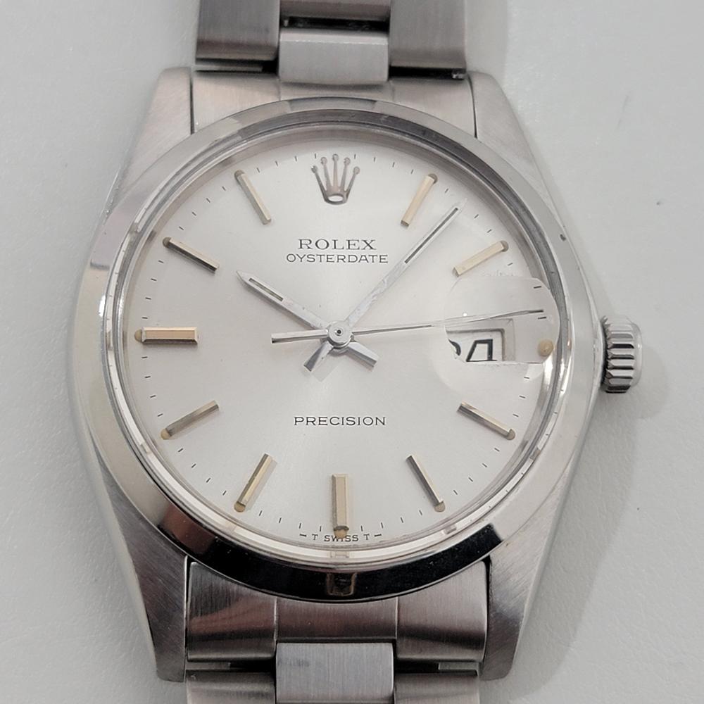 Classic icon, Men's Rolex Oysterdate Precision ref.6694, hand-wind dress watch, c.1981, in excellent working condition. Verified authentic by a master watchmaker. Gorgeous Rolex signed silver dial, applied baton index hour markers, silver minute and