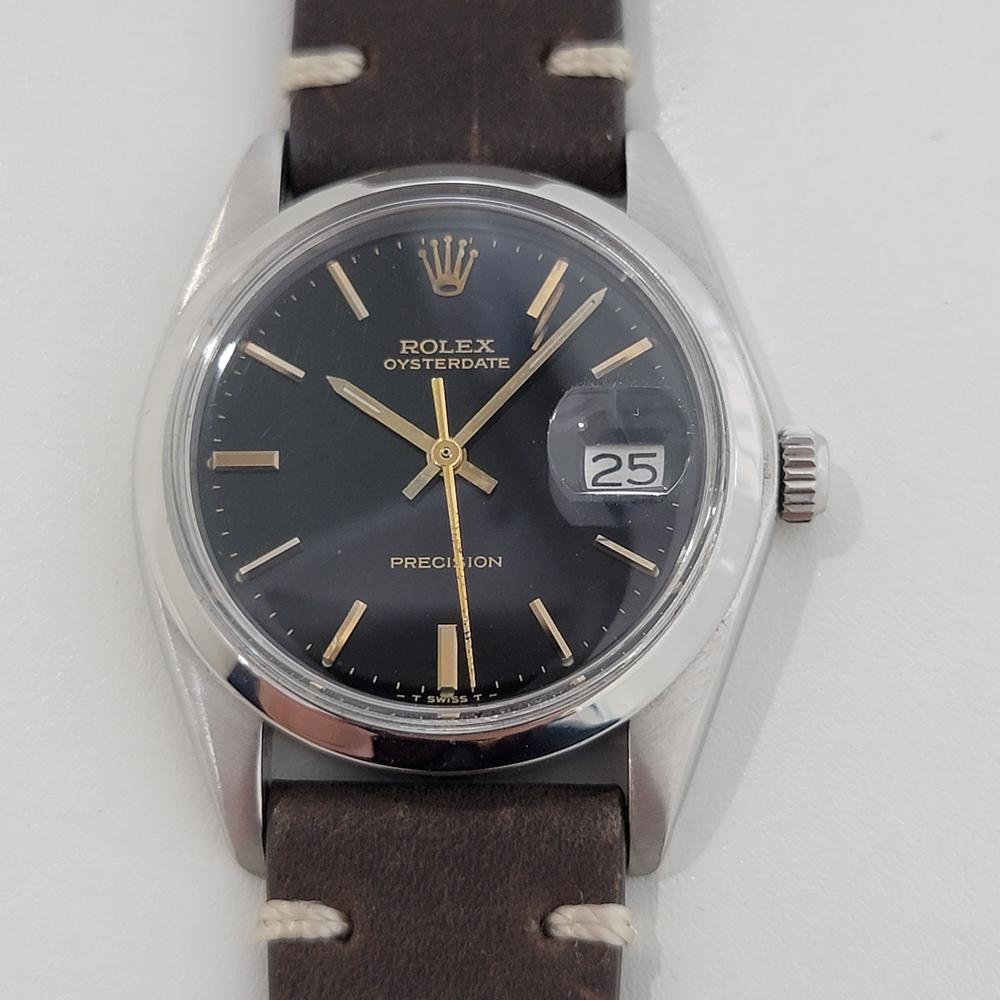 Classic icon, Men's Rolex Oysterdate Precision 6694 hand-wind dress watch, c.1970s. Verified authentic by a master watchmaker. Gorgeous Rolex signed black dial, applied indice hour markers, lumed minute and hour hands, sweeping central second hand,