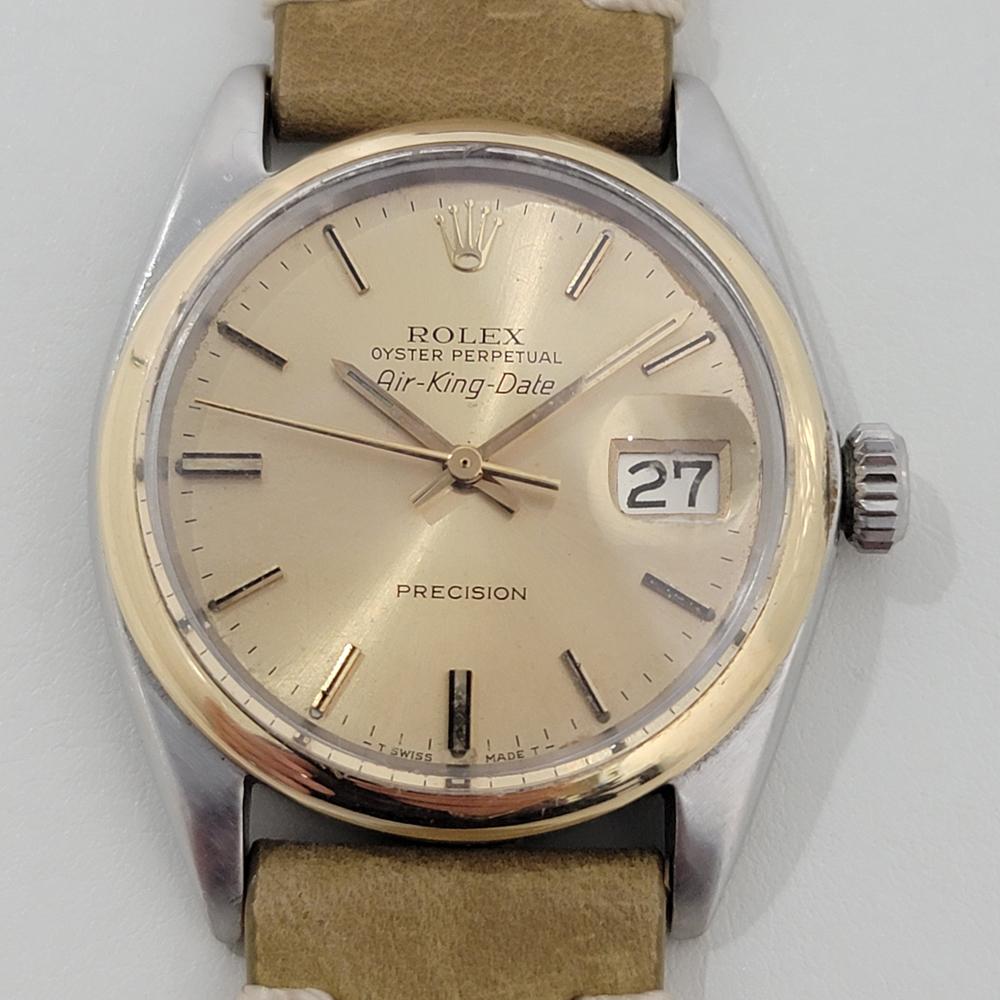 Rare classic, Men's Rolex ref.5701 Air King Date with 14k gold bezel automatic, c.1967, in excellent working condition. Verified authentic by a master watchmaker. Gorgeous Rolex signed gold dial, applied sword index hour markers, gilt minute and