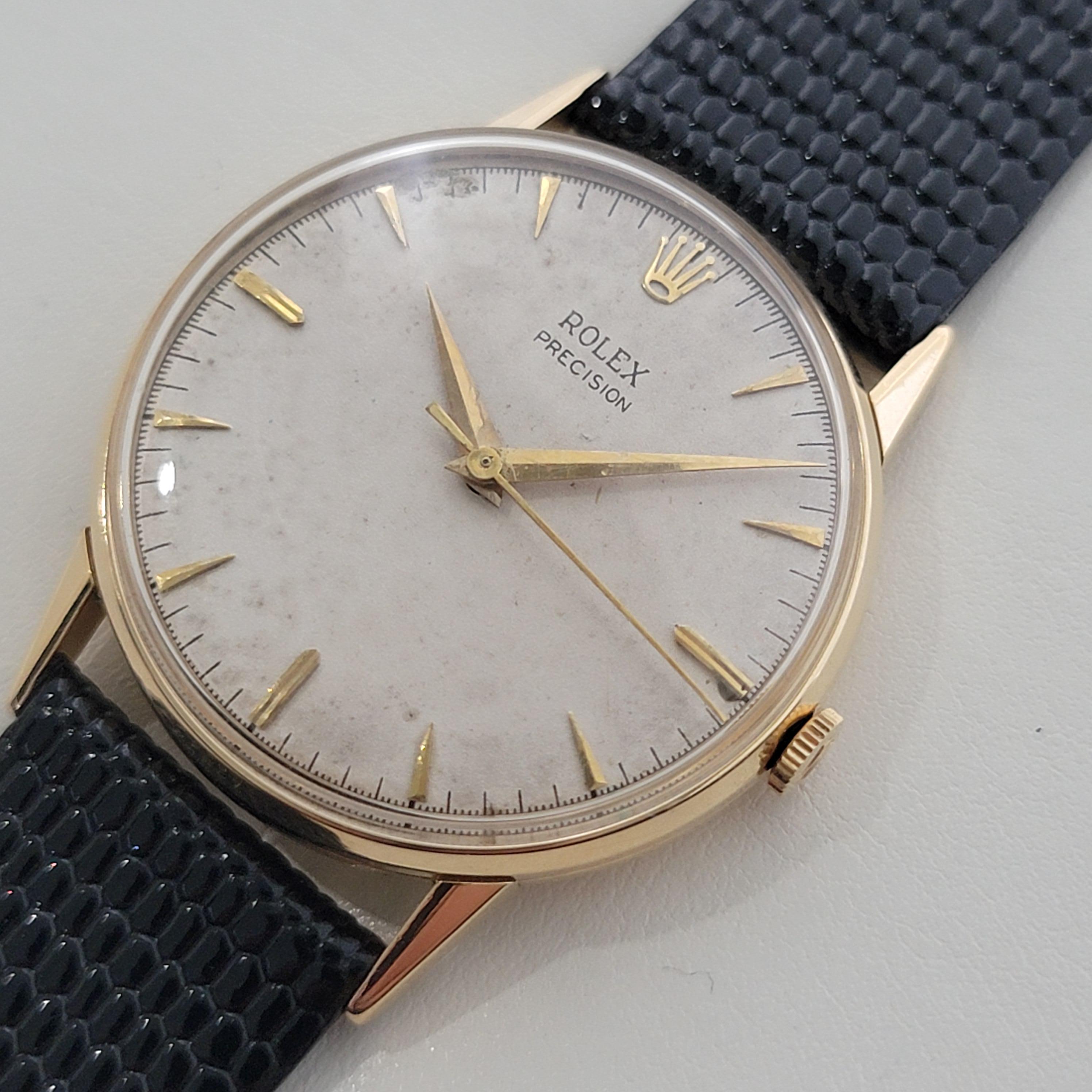 Classic luxury, rare and timeless 18k solid gold Rolex Precision 8961 manual wind dress watch, c.1959, in excellent working condition. Verified authentic by a master watchmaker. Gorgeous, unrefurbished Rolex signed tropical dial, applied dagger