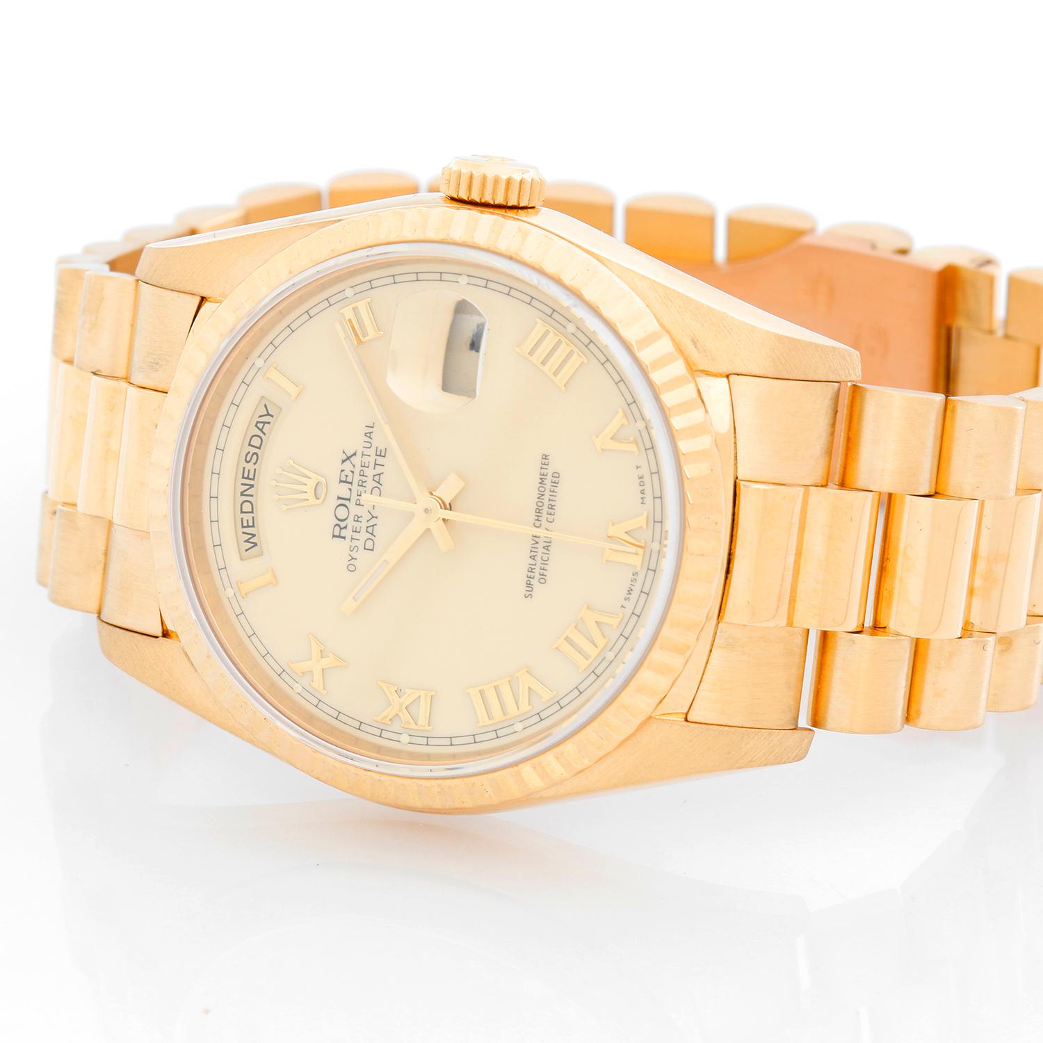 Men's Rolex President - Day-Date Watch 18238 - Automatic winding, 31 jewels, Quickset day/date, sapphire crystal. 18k yellow gold case with fluted bezel  (36mm diameter). Creme color dial with Roman numerals. 18K Yellow gold president bracelet .