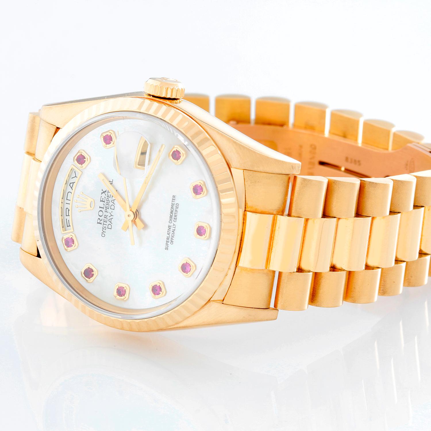 Men's Rolex President Day-Date Watch Mother of Pearl Ruby  18238 - Automatic winding, 31 jewels, Quickset day/date, sapphire crystal. 18k yellow gold case with fluted bezel  (36mm diameter). Factory Ruby Mother of Pearl dial. 18k yellow gold