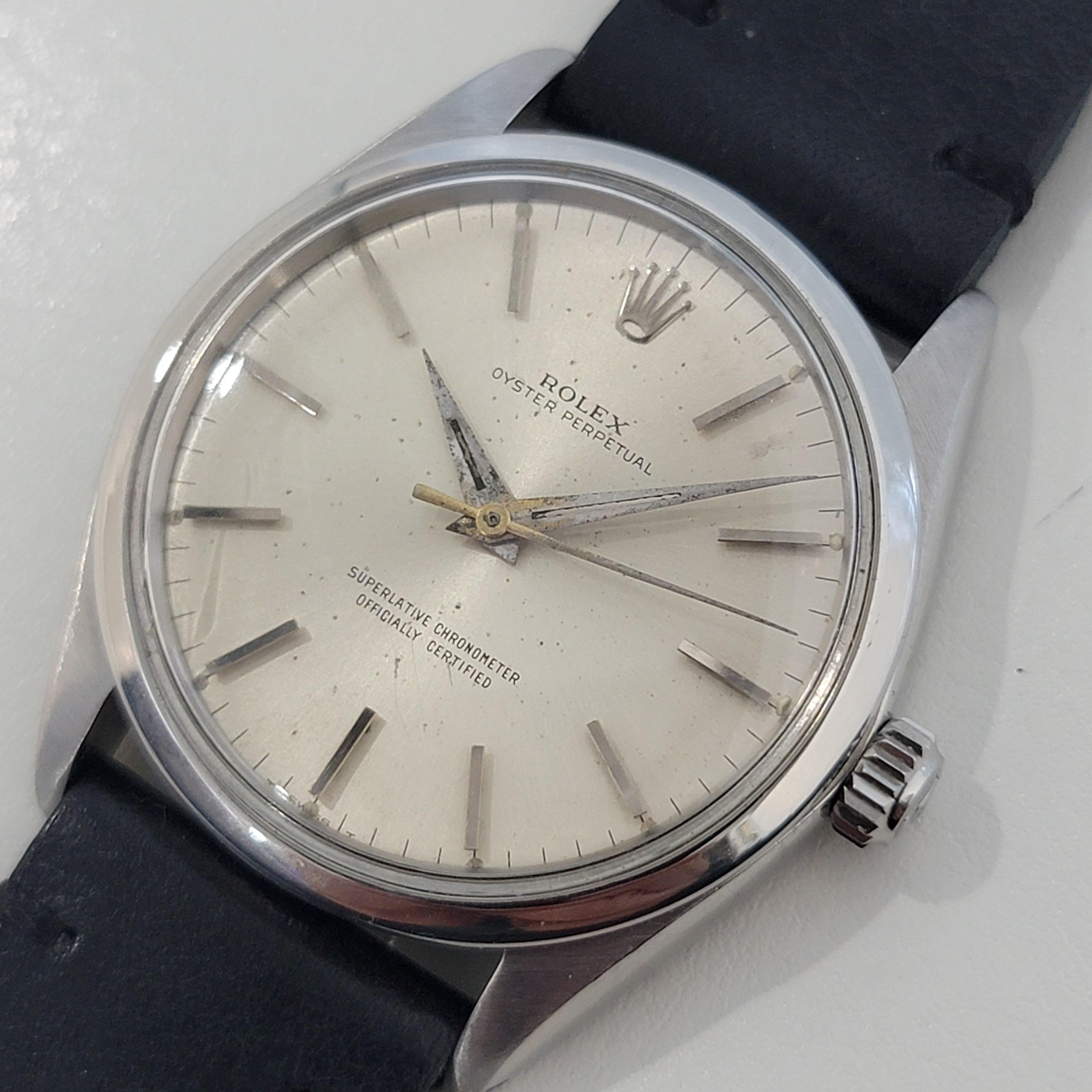 Timeless classic, Men's Rolex Ref.1002 Oyster perpetual automatic dress watch, c.1964. Verified authentic by a master watchmaker. Gorgeous Rolex signed silver dial, applied baton indice hour markers, gilt minute and hour hands, sweeping central