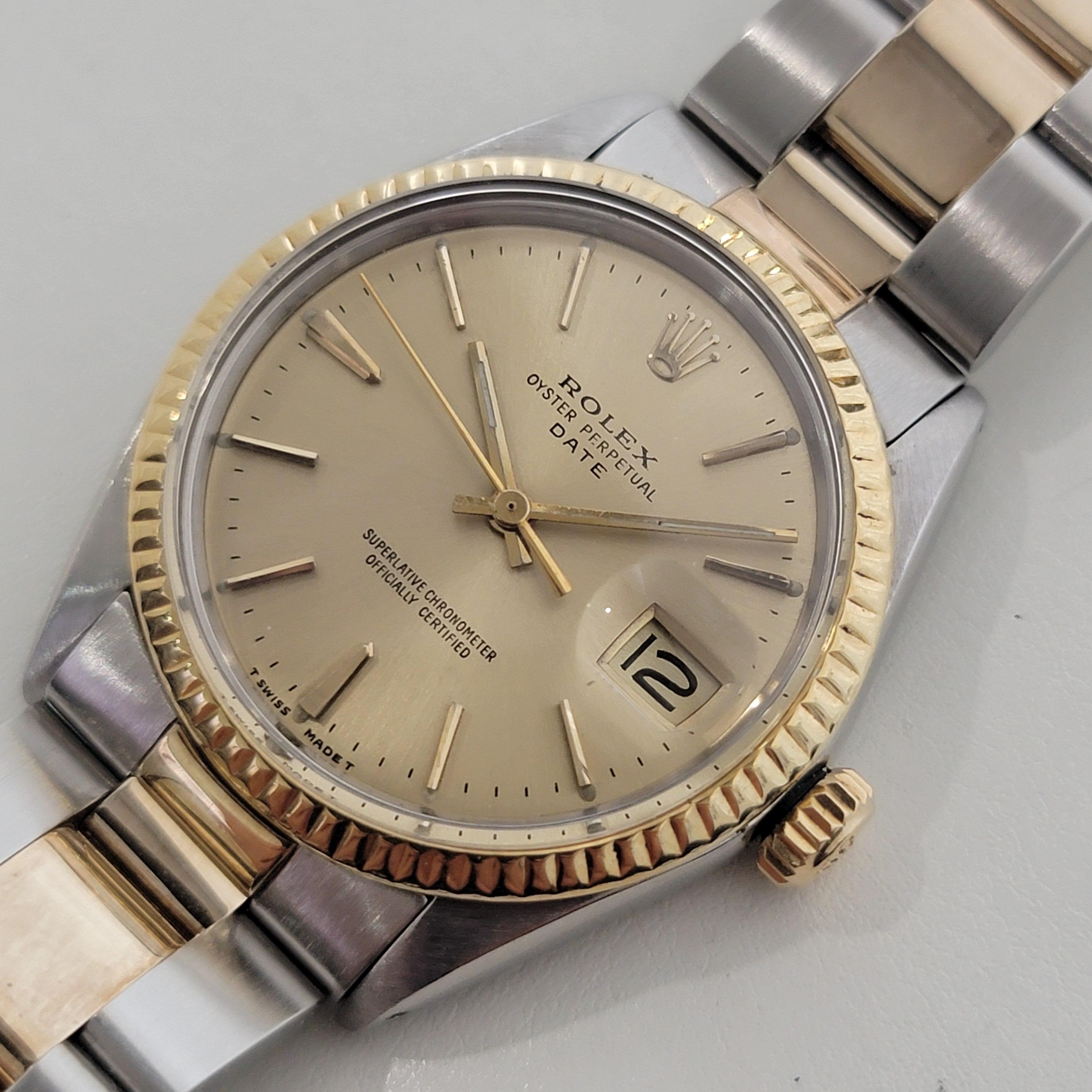 Timeless classic, Men's Rolex Oyster Perpetual Date Ref 1500 automatic with 14k solid gold bezel, c.1969, all original. Verified authentic by a master watchmaker. Gorgeous Rolex signed gold dial, applied gold indice hour markers, gilt minute and