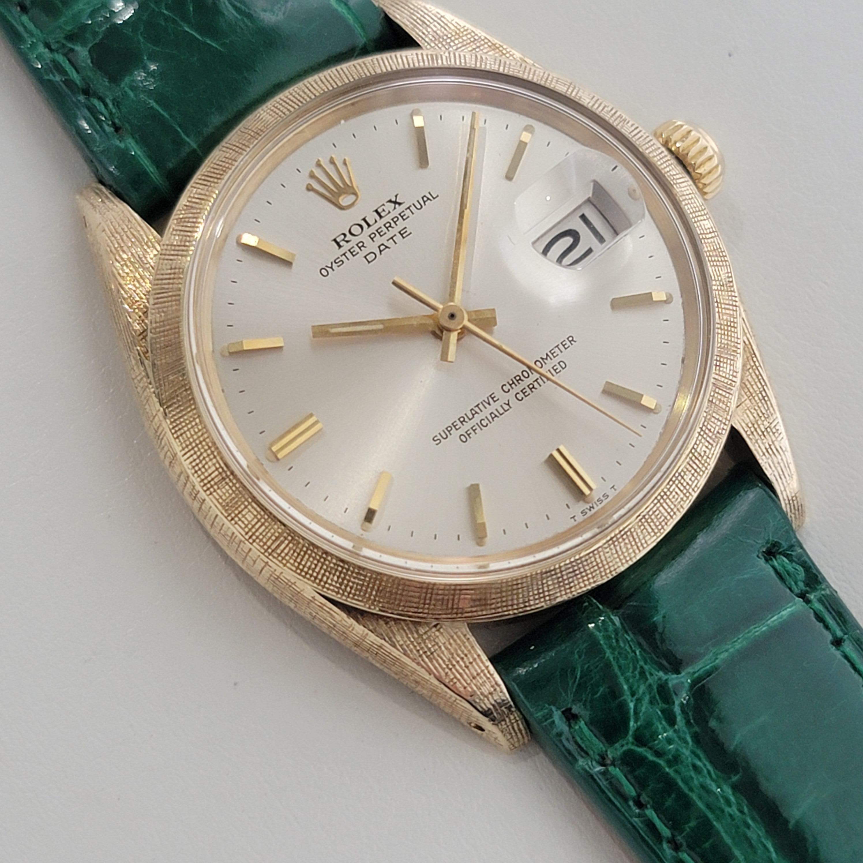 Gorgeous vintage classic, rare Men's solid 14k gold Rolex 1500 Oyster Perpetual Date automatic with Rolex factory etched case, c.1960s. Verified authentic by a master watchmaker. Gorgeous Rolex-signed silver dial, applied indice hour markers, gilt