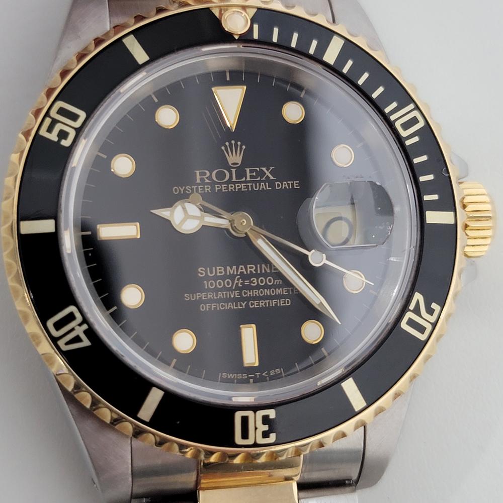 Ikonischer Luxus, Rolex Oyster Perpetual Date 16613 Submariner Automatik, 18 Karat Gold und Edelstahl, ca. 1989, alles original, mit Rolex Etui. Von einem Uhrmachermeister für echt befunden. Wunderschönes, schwarzes, signiertes Rolex-Zifferblatt,