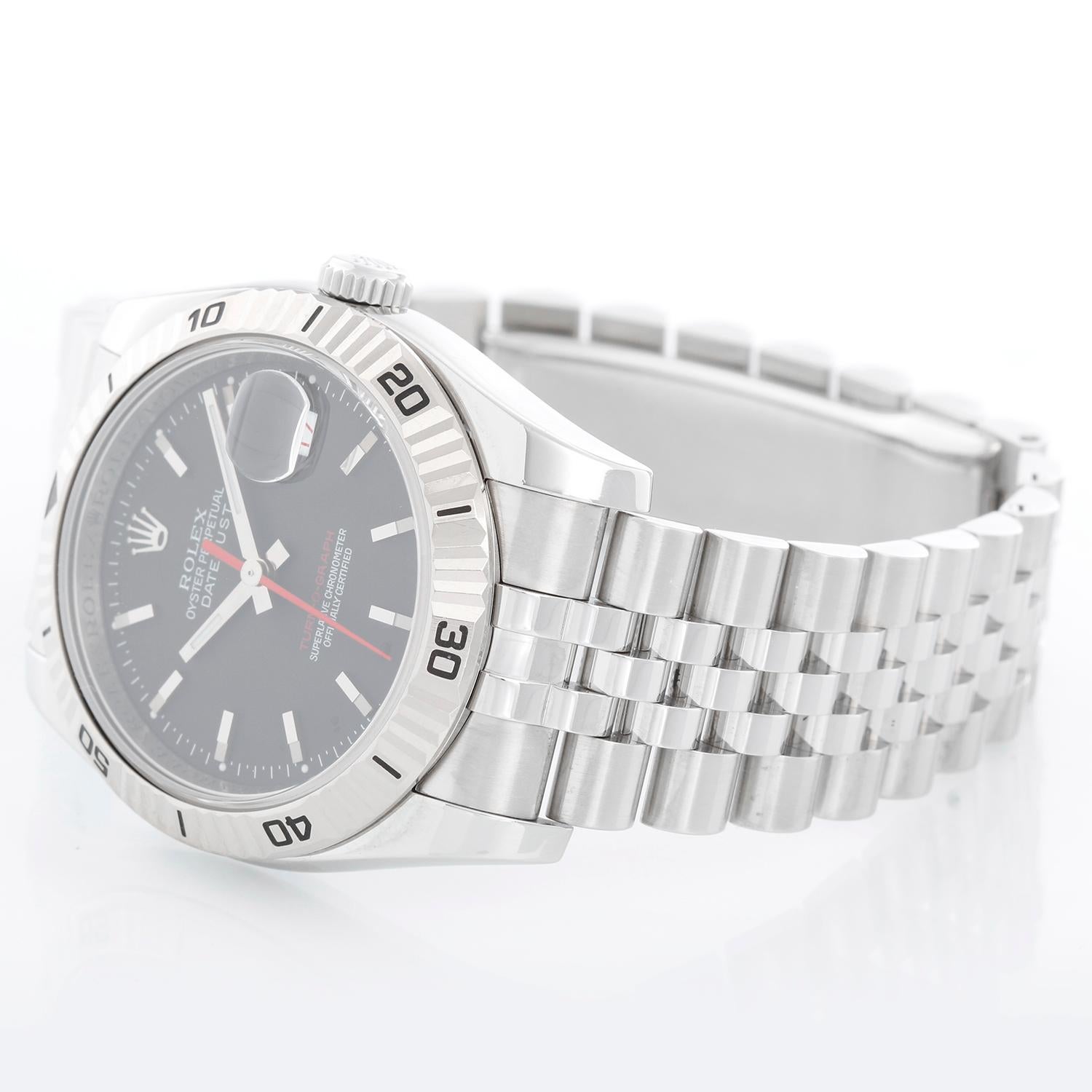 Men's Rolex Turnograph Datejust Stainless Steel Watch 116264 - Automatic winding, 31 jewel, sapphire crystal. Stainless steel case with 18k white gold Thunderbird bezel  (36mm diameter). Charcoal dial with stick markers; red date and second hand.