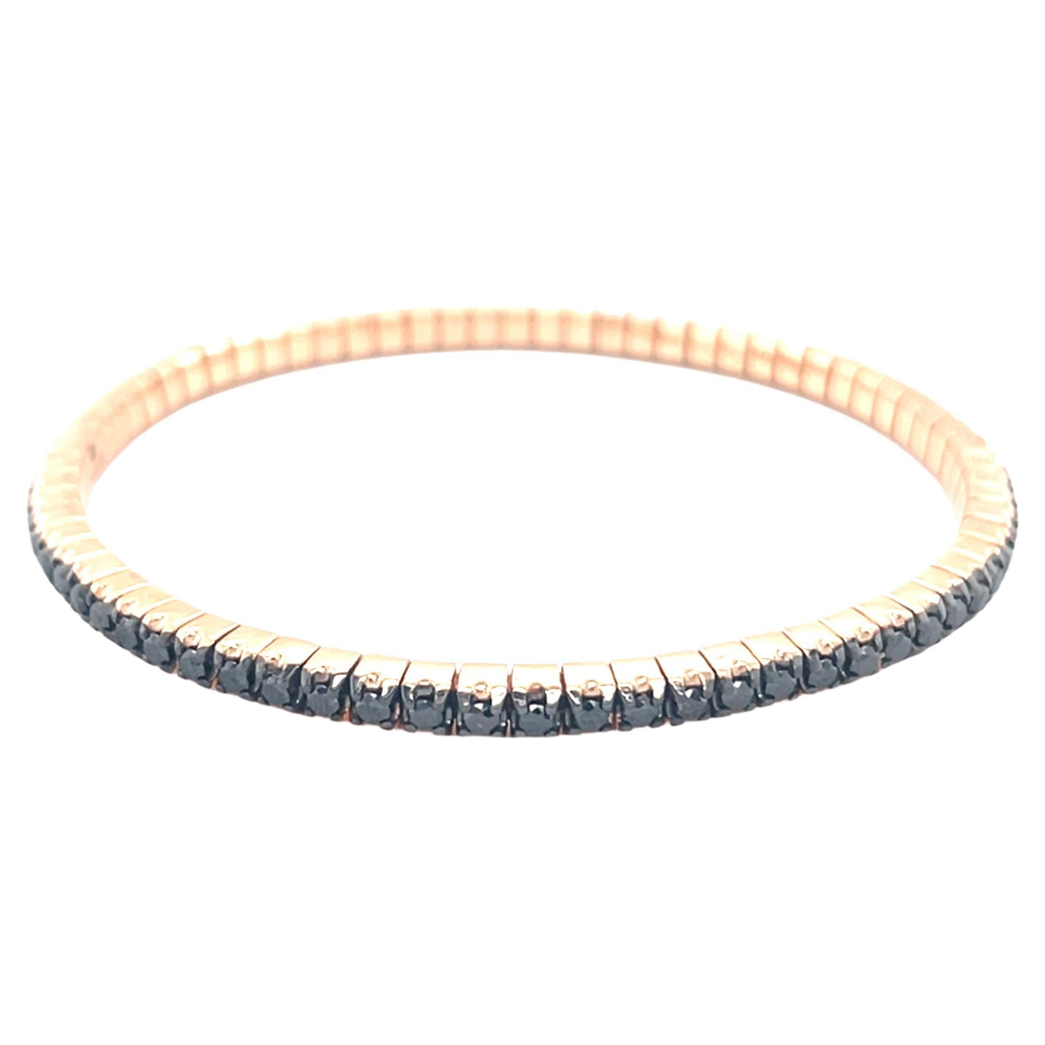 18K rose gold bracelet is from our Men's Collection. This masculine flexible bracelet is made of 71 natural round black diamonds in total of 2.43 Carat placed along the bracelet. The diameter of the bracelet is 6.5cm. Total metal weight is 16.22 gr.
