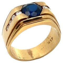 Anello da uomo con zaffiro e diamante taglio rotondo