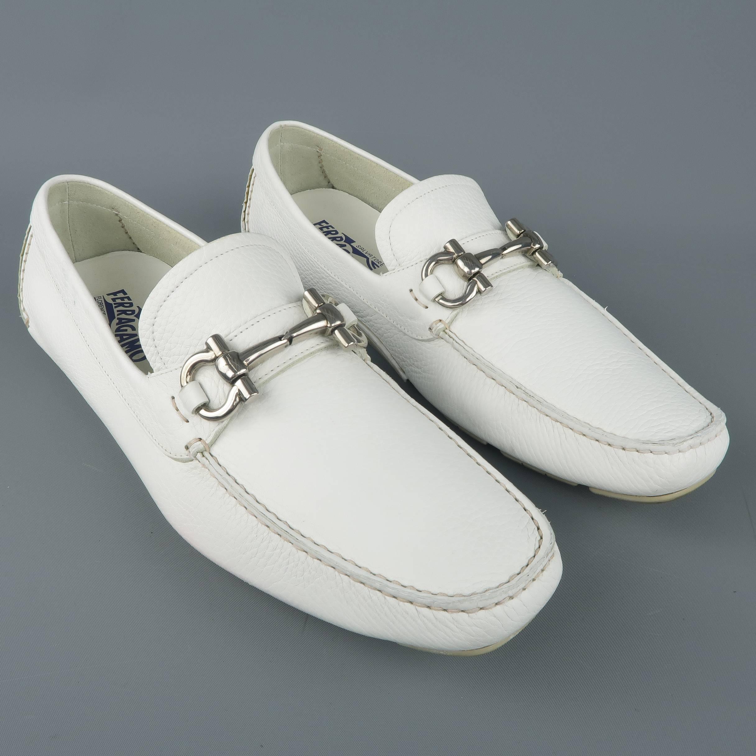 SALVATORE FERRAGAMO loafer comes in white textured leather with a silver tone horsebit detail and driver sole. Scruffs throughout. As-is. Made in Italy.
 
Good Pre-Owned Condition.
Marked: UK 10
 
Outsole: 12 x 4 in.
