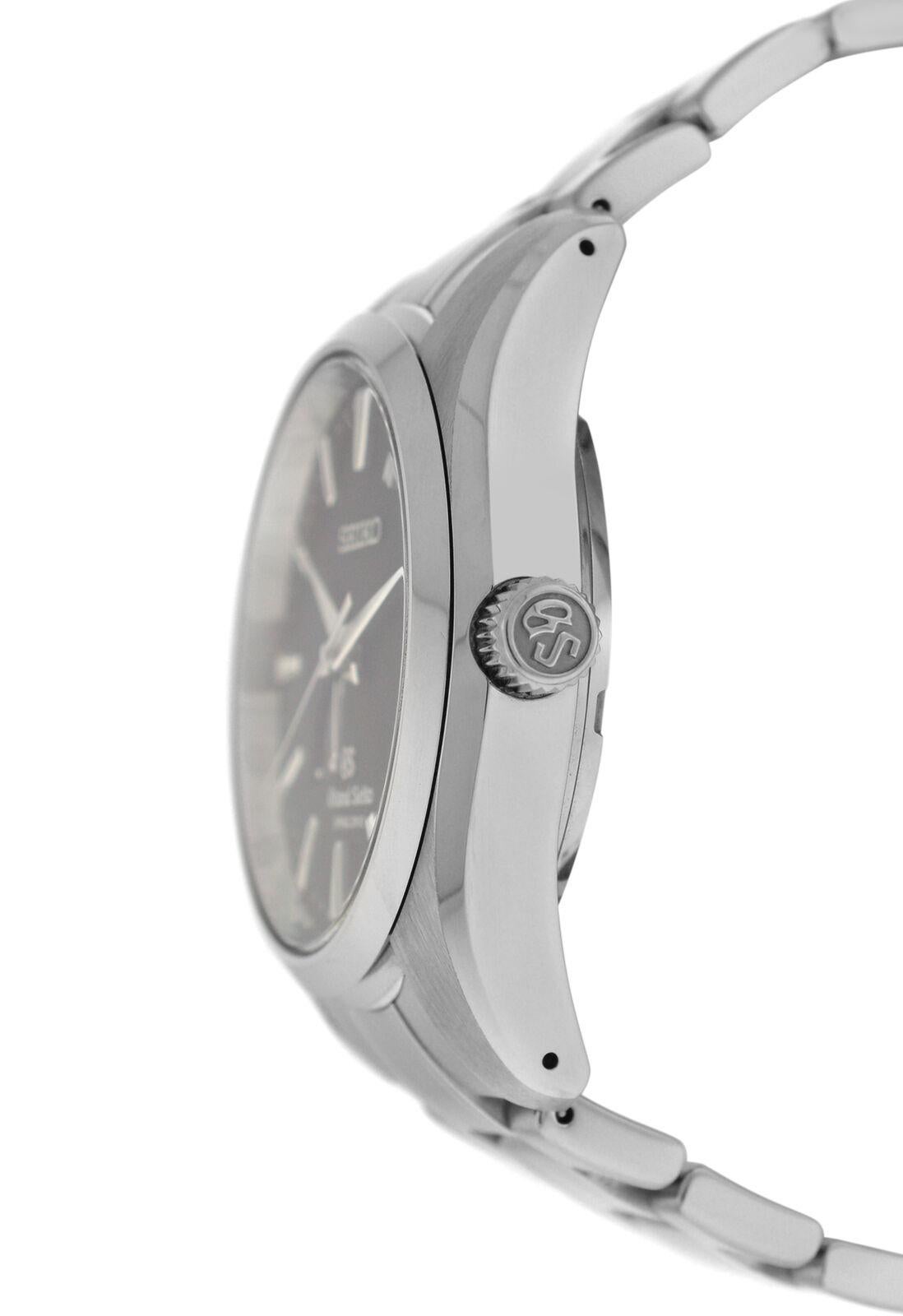 Brand	Seiko
Model	Grand Seiko 9R65-0AA0 
Gender	Men's
Condition	Pre-owned
Movement	Swiss Automatic 
Case Material	Stainless steel
Bracelet / Strap Material	
Stainless steel

Clasp / Buckle Material	
Stainless steel	
Clasp Type	Deployment
Bracelet /