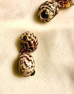 Men’s shell, gold and sapphire cufflinks