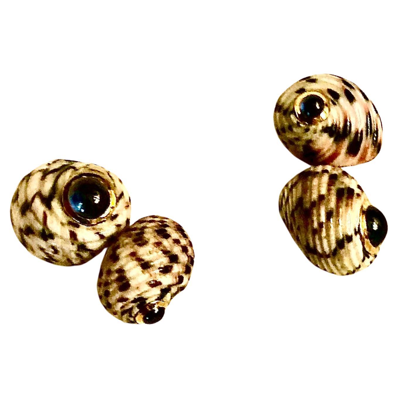 Men’s shell, gold and sapphire cufflinks