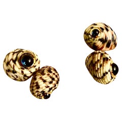 Men’s shell, gold and sapphire cufflinks