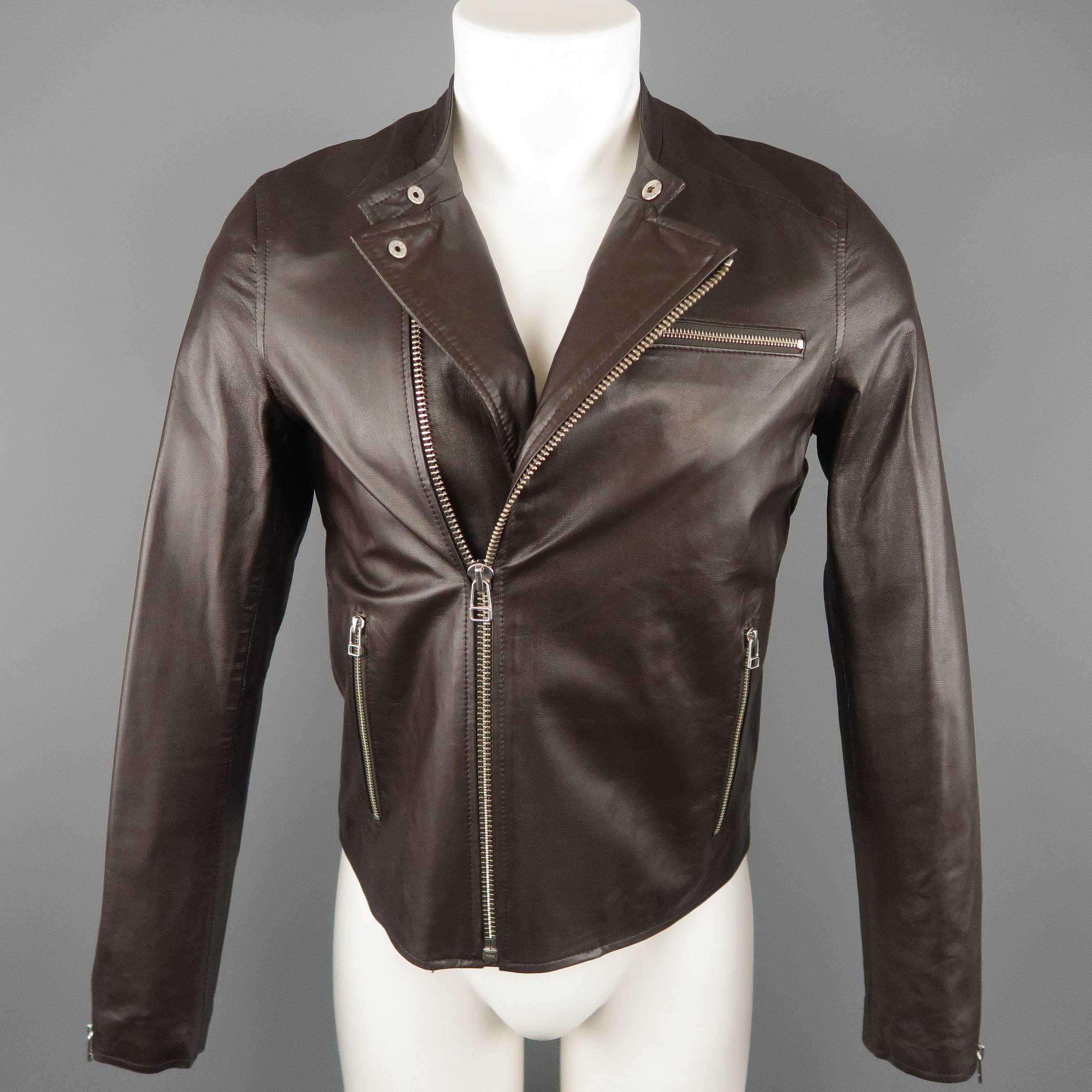 SHIPLEY & HALMOS motorcycle jacket comes in soft brown leather with a band snap collar, asymmetrical zip, zip cuffs, and zip pockets.
 
Excellent Pre-Owned Condition.
Marked: S
 
Measurements:
 
Shoulder: 16 in.
Chest: 38 in.
Sleeve: 25.5