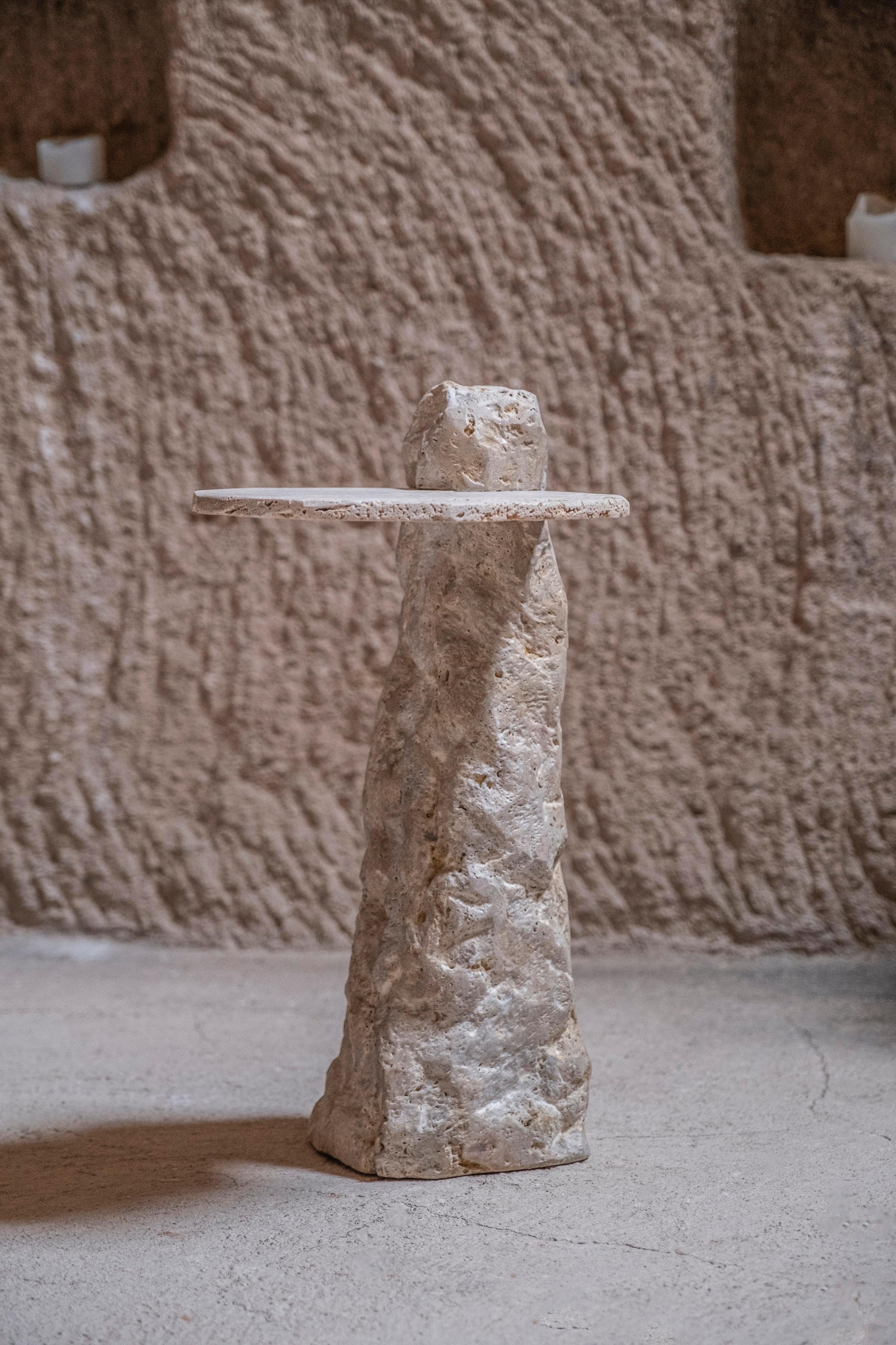 Mens Side Table by Andres Monnier
Unique Piece.
Dimensions: D 20 x W 20 x H 50 cm.
Materials: Travertine.

Treko Concrete is a Mexican studio based in Ensenada, that aims to create functional handcrafted furniture and sculptural pieces to tell